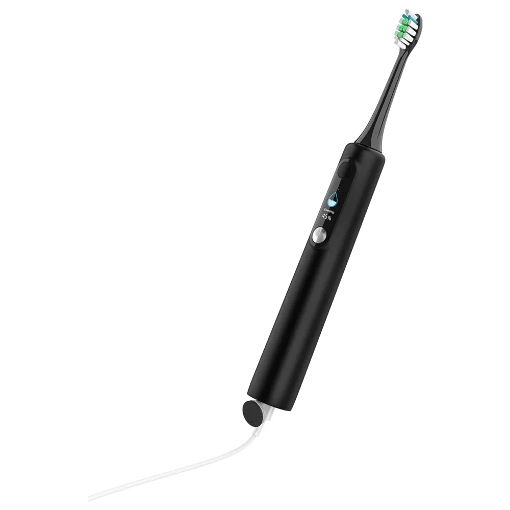 Grin Teeth ET 1B black sonic toothbrush with USB Type C fast charging cable connected