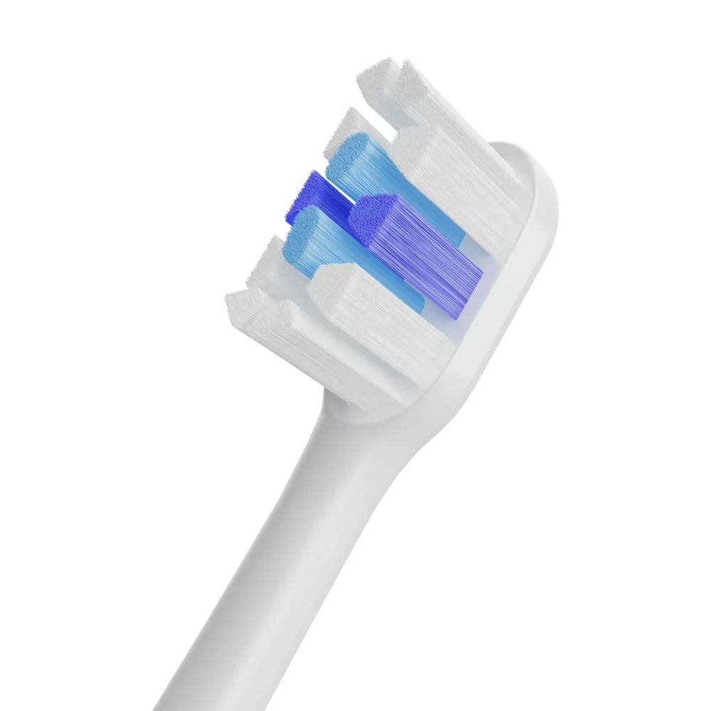 Close-up of Grin Teeth ET 3B minimalist sonic toothbrush bristles in blue and white, designed for deep cleaning and gentle gum care