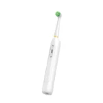 Angled view of oscillating electric toothbrush with round head