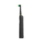 Grin Teeth ET 2B rotating electric toothbrush in black, side view showing textured grip