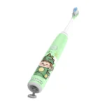 Grin Teeth ET 5A electric toothbrush for kids ages 4–8 with dinosaur design and pressure sensor