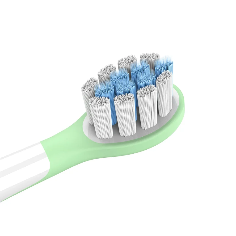 Close-up of Grin Teeth ET 5 electric toothbrush brush head for kids ages 4–8 with soft bristles and pressure sensor support
