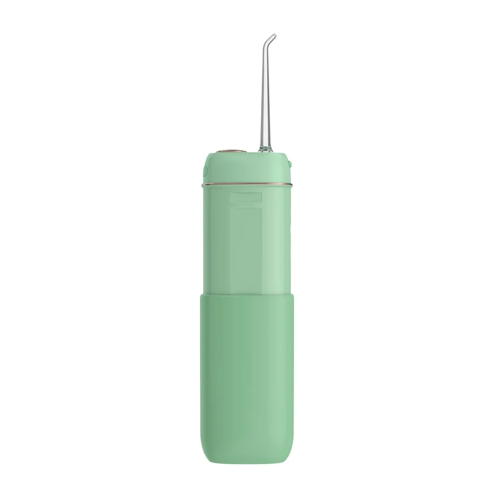 Back view of Grin Teeth WF 3B portable oral irrigator in mint green with sleek compact body and angled nozzle