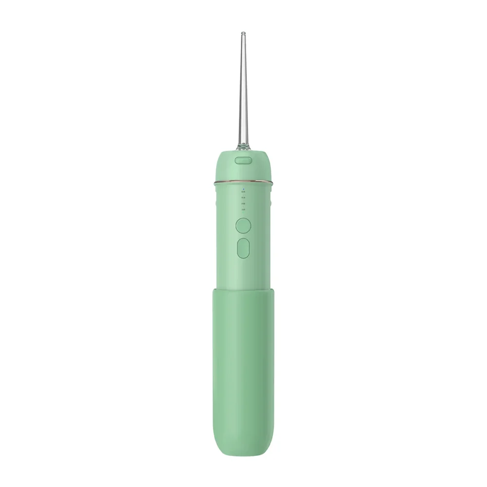 Front view of Grin Teeth WF 3B portable oral irrigator in mint green, showing control buttons and LED mode indicators
