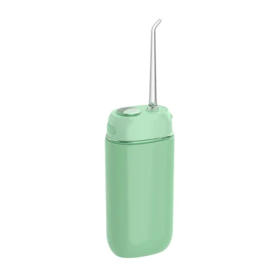 Grin Teeth WF 3B portable oral irrigator in mint green with sleek, compact design and angled nozzle