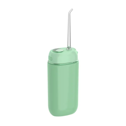 Portable Oral Irrigator – Grin Teeth WF 3B in Mint Green Grin Teeth WF 3B portable oral irrigator in mint green with sleek, compact design and angled nozzle