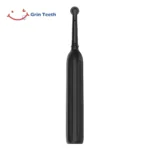 Grin Teeth ET 6C rotating head electric toothbrush back view in black with quiet design