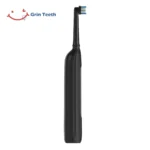 Quiet black rotating head electric toothbrush side profile view of Grin Teeth ET 6C