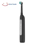 Side view of Grin Teeth ET 6C quiet rotating head electric toothbrush in black with sleek ergonomic design