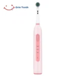 Grin Teeth ET 6A rotating oscillating electric toothbrush in quiet pink color