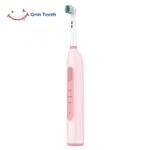 Grin Teeth ET 6A rotating oscillating electric toothbrush angled side view showing quiet brush head design
