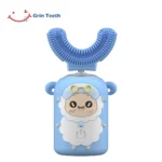 Front view of blue automatic toothbrush for kids with cute sheep design and U-shaped brush head