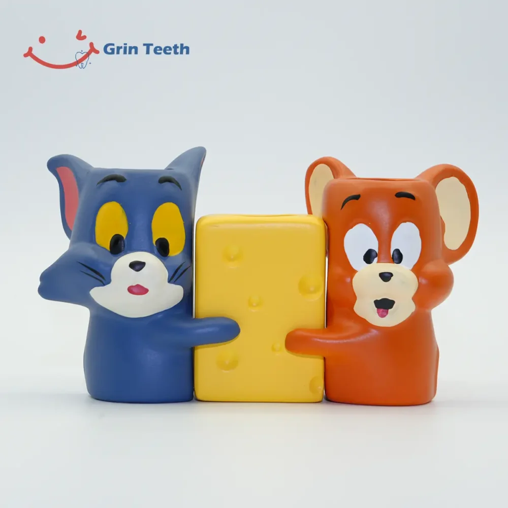 Tom and Jerry ceramic toothbrush holder for kids in a fun cartoon couple style