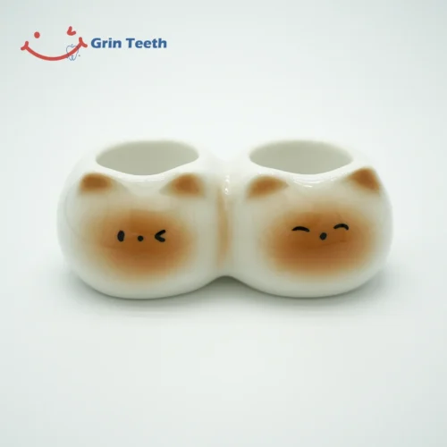 Ceramic cute toothbrush holder with 2 slots and cat face design