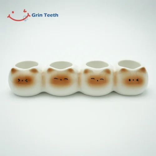 Cute Toothbrush Holder with 4 Slots – Grin Teeth H 3A Ceramic cute toothbrush holder with 4 slots and cat faces