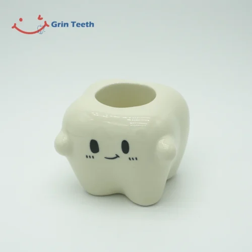 Electric Toothbrush Holder with 1 Slot – Tooth Design Tooth-shaped ceramic electric toothbrush holder with 1 slot, front view