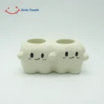 Cute ceramic electric toothbrush holder with 2 slots in a tooth-shaped design