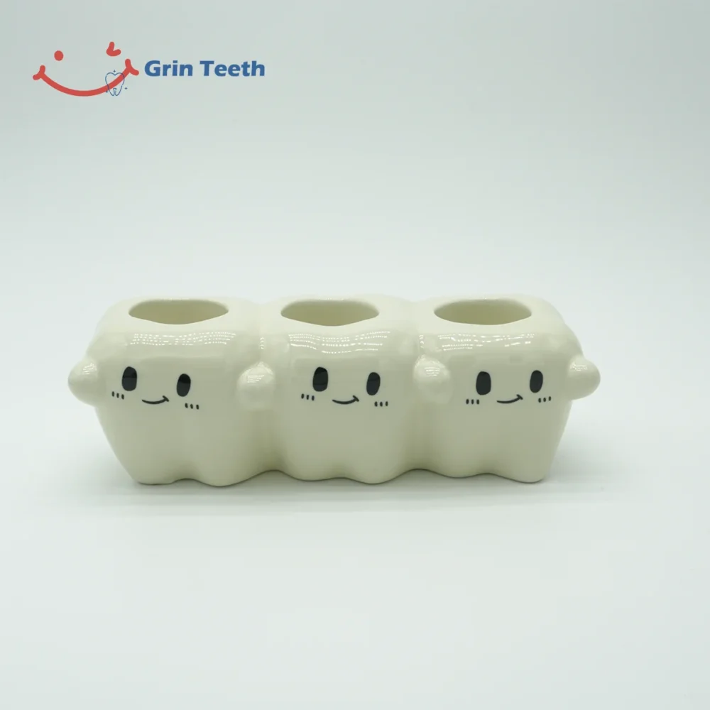 Tooth-shaped ceramic electric toothbrush holder with 3 slots