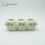 Tooth-shaped ceramic electric toothbrush holder with 3 slots