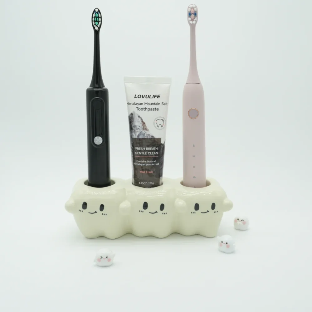Ceramic tooth-inspired electric toothbrush holder with 2 toothbrushes and 1 toothpaste