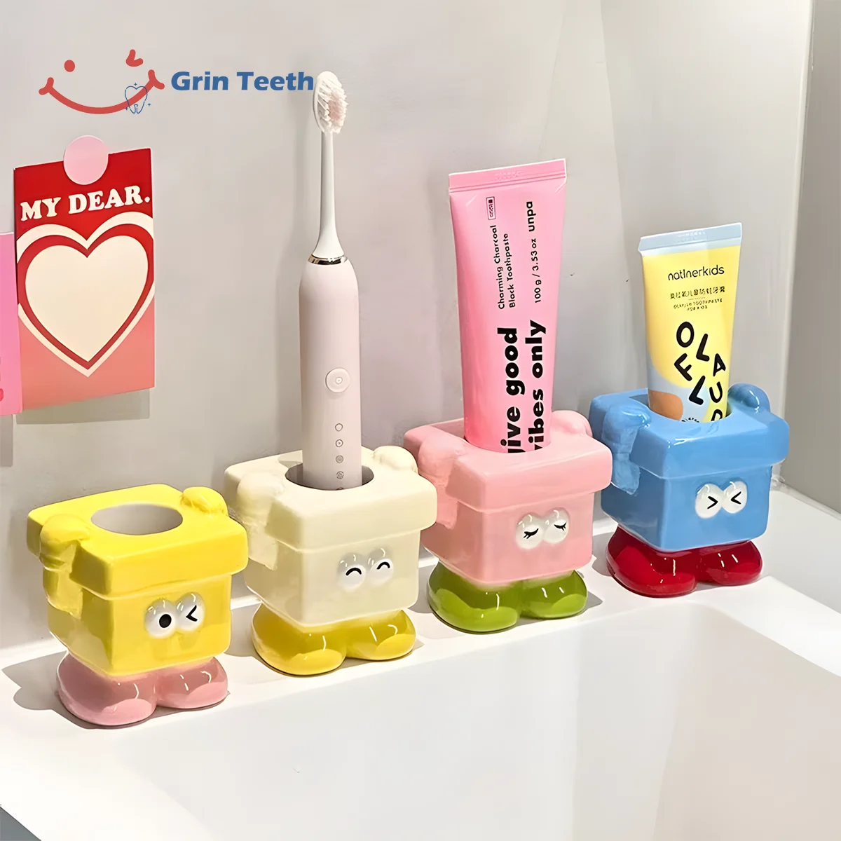 Childrens Toothbrush Holder – Colorful Bathroom Organizer Colorful children’s toothbrush holders placed by the bathroom mirror, storing toothbrushes and toothpaste for kids’ brushing routine.