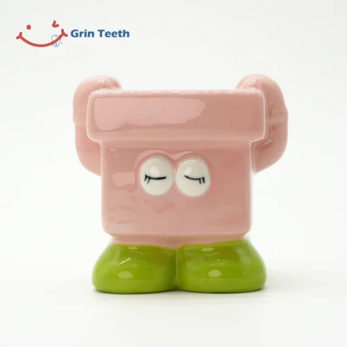 Children’s Toothbrush Holder – Pink Buddy for Happy Brushing Pink children’s toothbrush holder with playful design to inspire kids’ daily brushing joy.