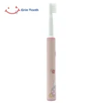 Side view of pink electric toothbrush for teen girls with braces – Grin Teeth ET 9A