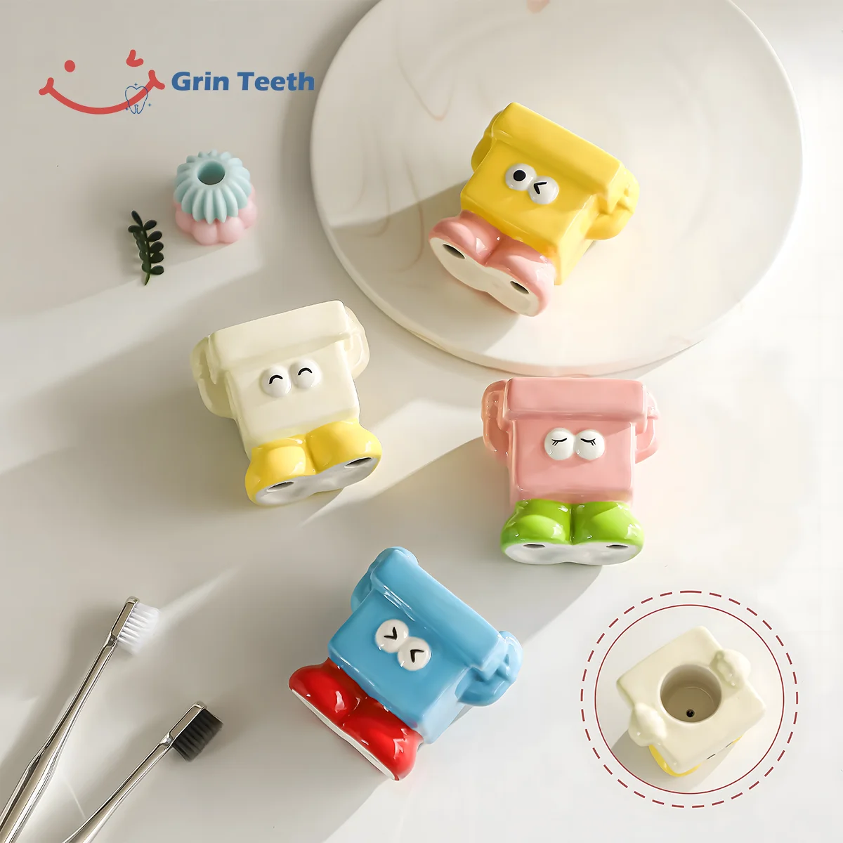 Kids Toothbrush Holder – Colorful Set for Playful Brushing Top view of colorful kids toothbrush holders in yellow, white, pink, and blue for fun and organized brushing.