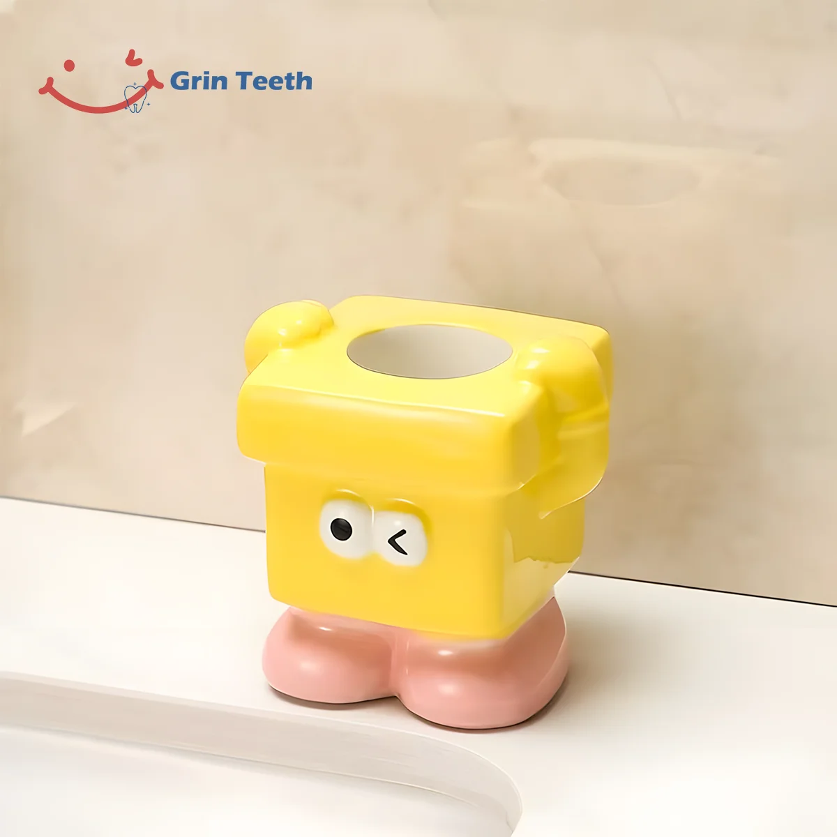 Kids Toothbrush Holder – Yellow Sink Side Brushing Buddy Yellow kids toothbrush holder placed by the sink for easy and fun daily brushing access.