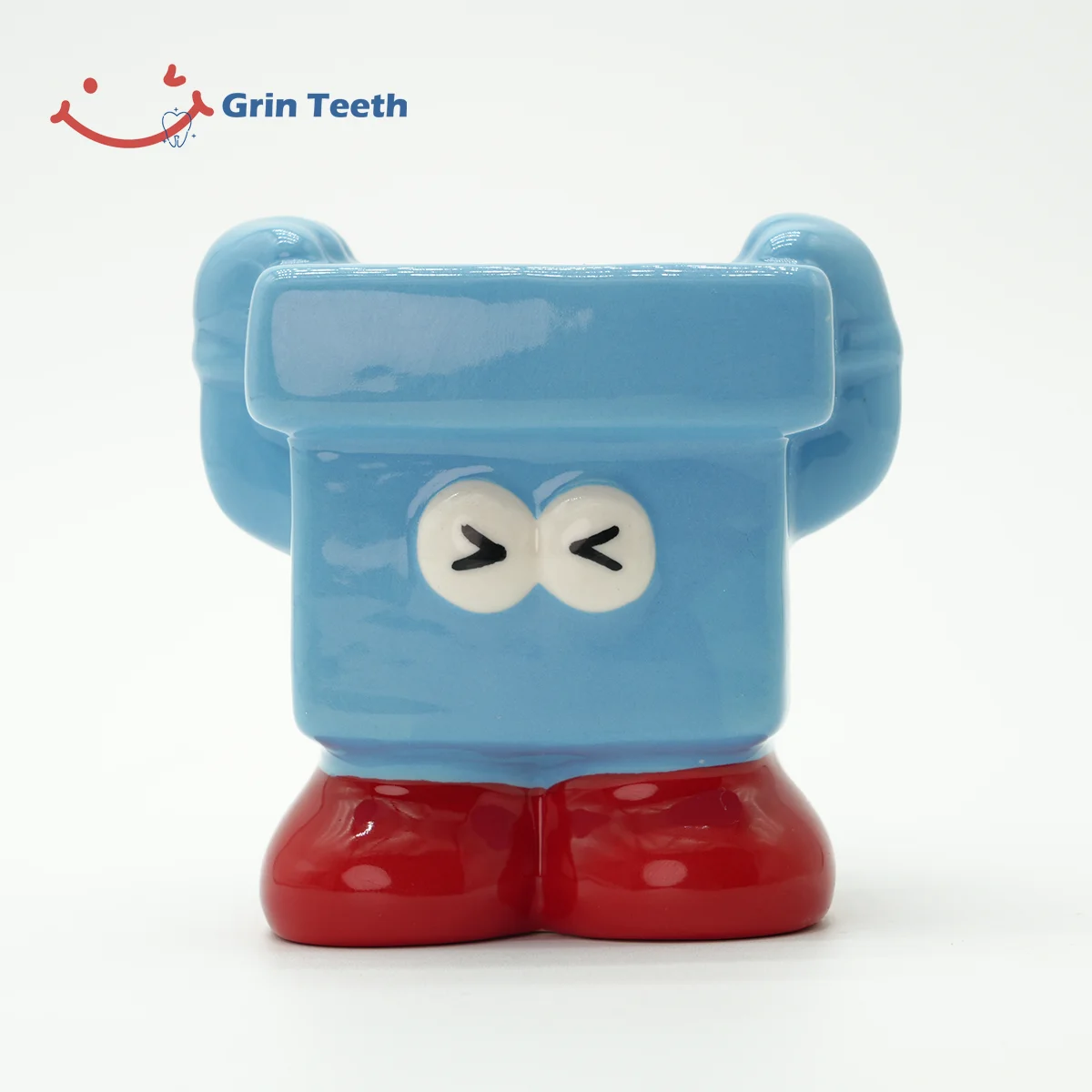 Blue Little Ones toothbrush holder with playful closed-eye design, perfect for kids’ daily brushing.
