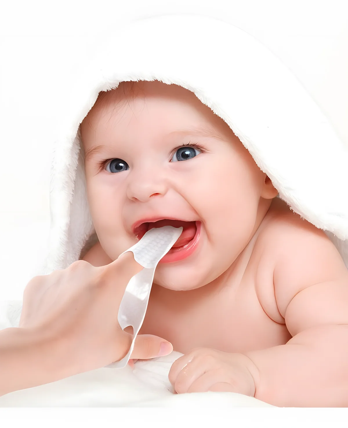 Baby using Grin Teeth K 1 baby dental wipes; caregiver cleans gums and tongue with soft finger wipe—safe, hygienic, eco-friendly.