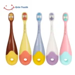 Grin Teeth KT 3 donut toddler toothbrush with ultra-soft bristles, non-toxic materials, and a fun easy-grip donut handle