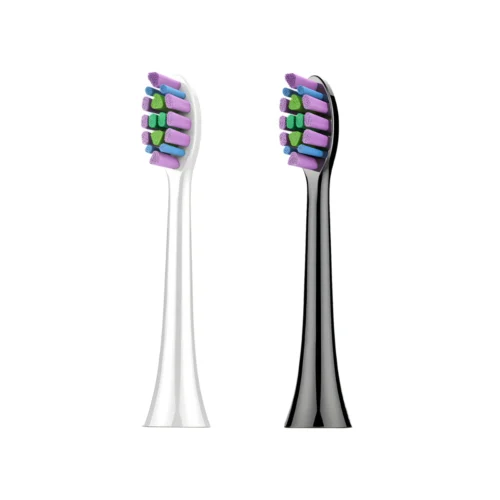 Black and white ET 1 toothbrush heads with soft polished bristles and color-fade replacement indicator