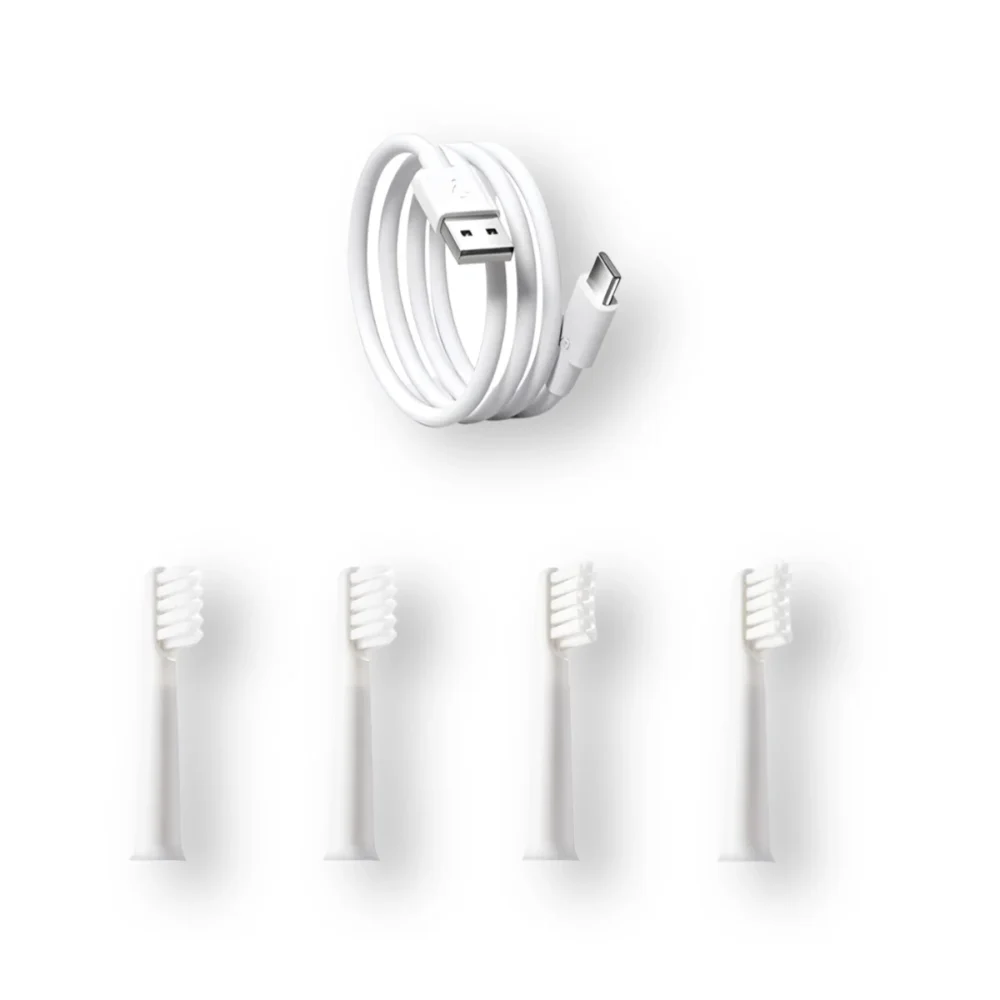 ET 9 electric toothbrush accessories showing four replacement brush heads and a USB charging cable